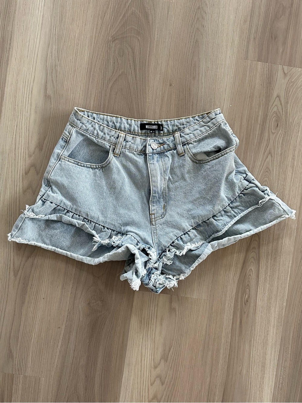 Missguided Light Wash Denim Ruffle Hem Shorts